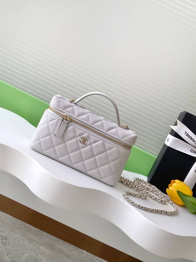 25C Elegant And Compact Chain-Strap Clutch Bag. Made From Small-Grain Calf Leath