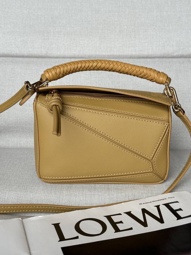 Genuine Leather Mini Smooth Cowhide Leather Puzzle Handbag Puzzle Features A Uni