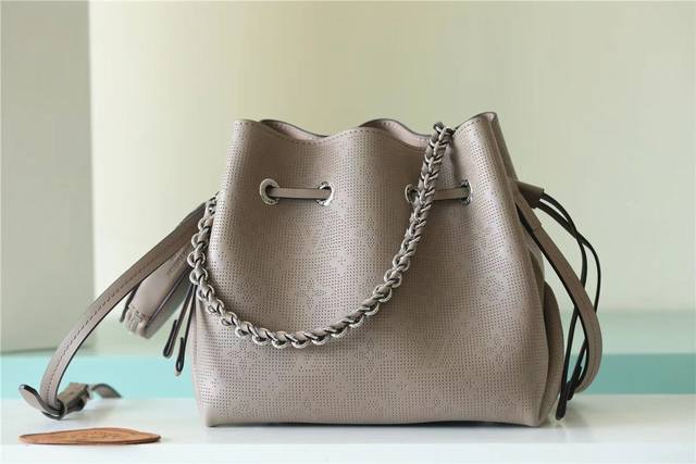 Top-Tier Authentic Product. This Bella Bucket Bag With A Coin Pouch Is Crafted F