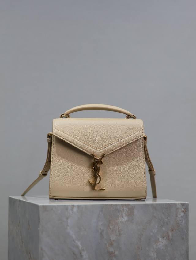 Apricot Gold Buckle Caviar Cassandra Mini Handbag!The Standout Feature Of This S