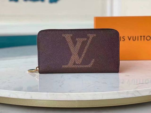 M60017 Brown Painted Small Single-Zip Wallet This Zippy Wallet Is Made From Dami