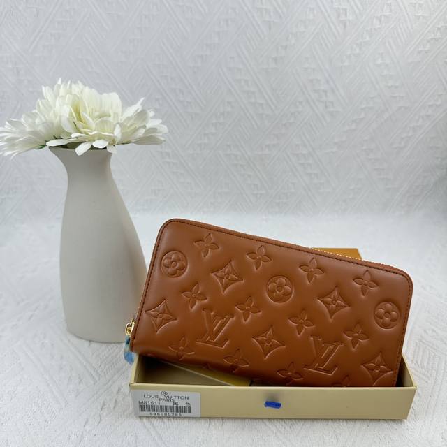 M81511 Earth Yellow Crafted From Padded Monogram-Embossed Lambskin, This Piece C