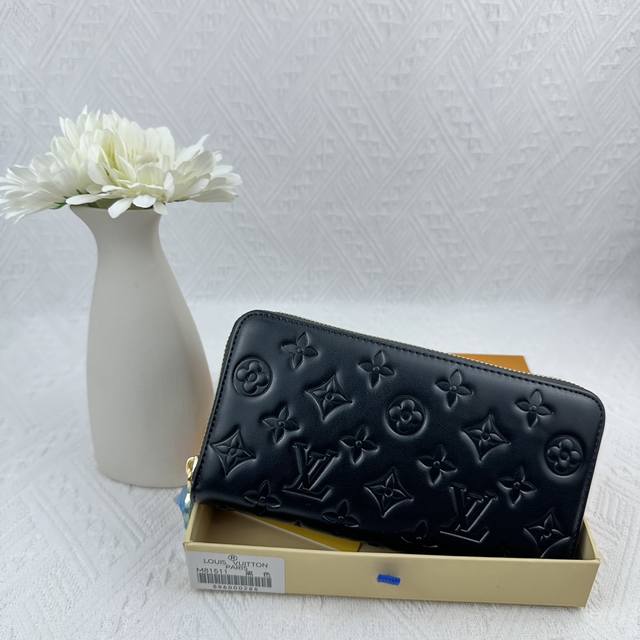 M81511 Black Crafted From Padded Monogram-Embossed Lambskin, Perfectly Complemen