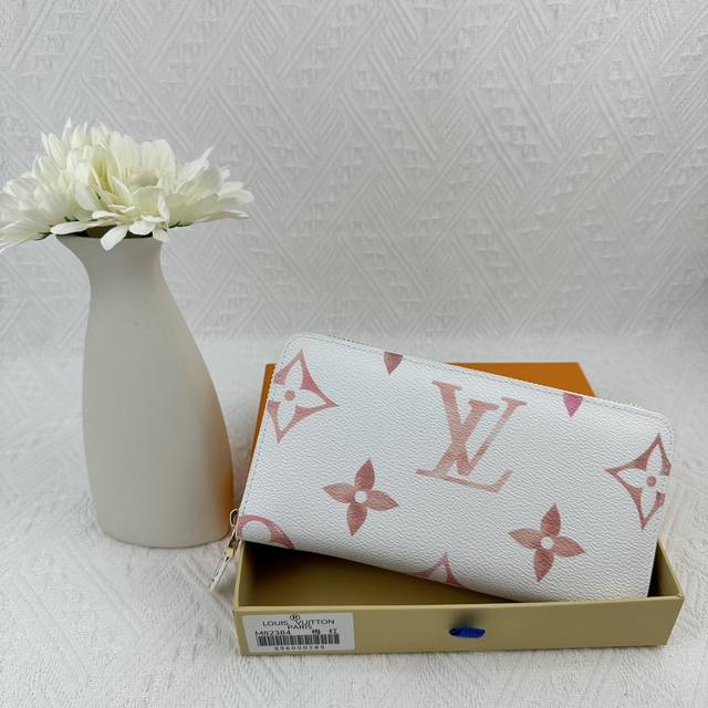 M82384 This Practical Monogram Canvas Wallet Features A Zipper Closure And Can H