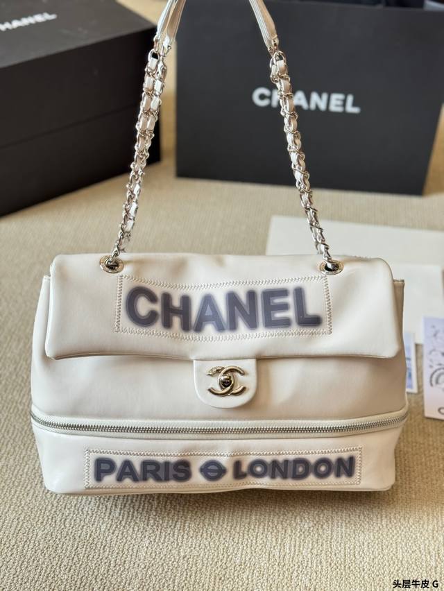Top-Grain Leather How Could You Miss This Airport Bag? The Little Chanel Is Abso