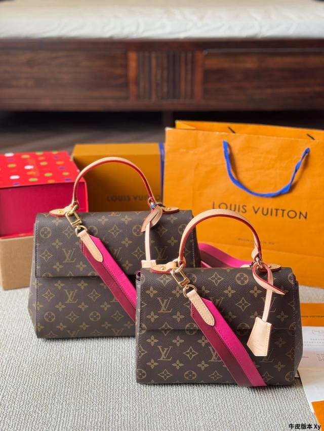 Leather Version Lv Cluny Bb Handbag. This Bag Features The Trendy Vibrant Color