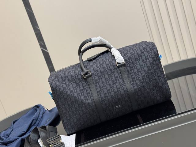 Dior Travel Bag Travel Bag: Compared To Lv's Keepall, This Dior Travel Bag Is An