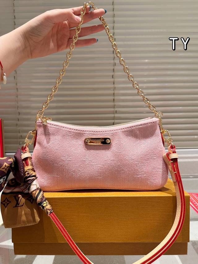 Washed Denim Liv Pochette Handbag The Liv Pochette Double Design In Monogram Can