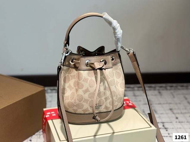 Comes With A Box. Coach Bucket Bag Is Here! Features A Drawstring Closure For Ea