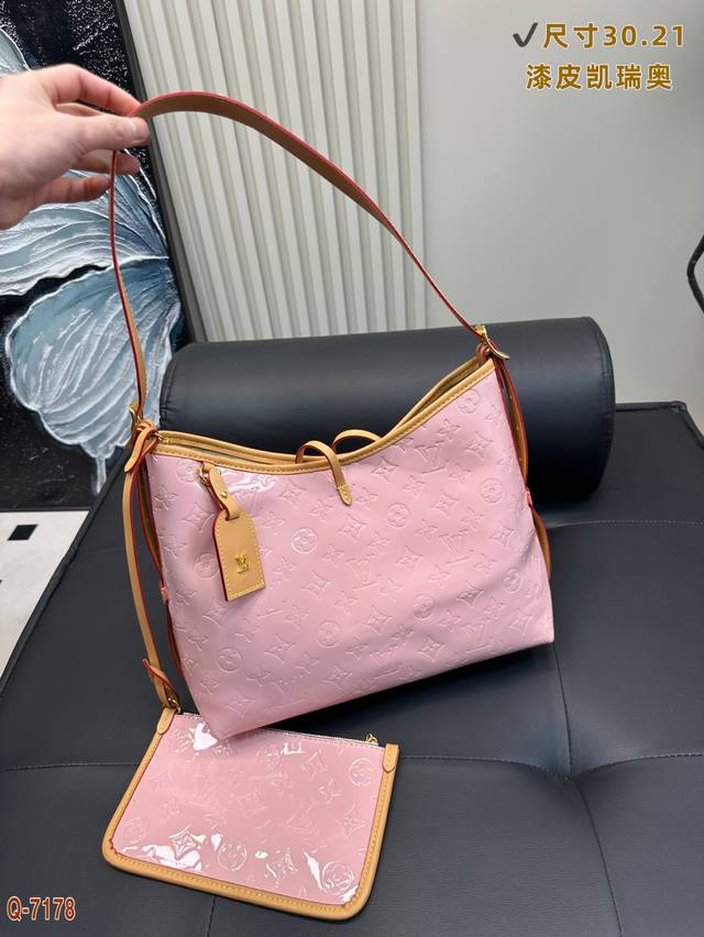 Lv Lacquered Carry All Instantly Transforms Into A Stylish Goddess When Worn On