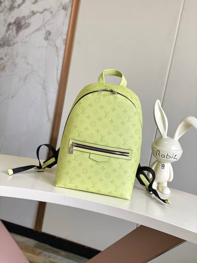 163 14076This Discovery Slim Backpack Combines Monogram Canvas And Taga Cowhide