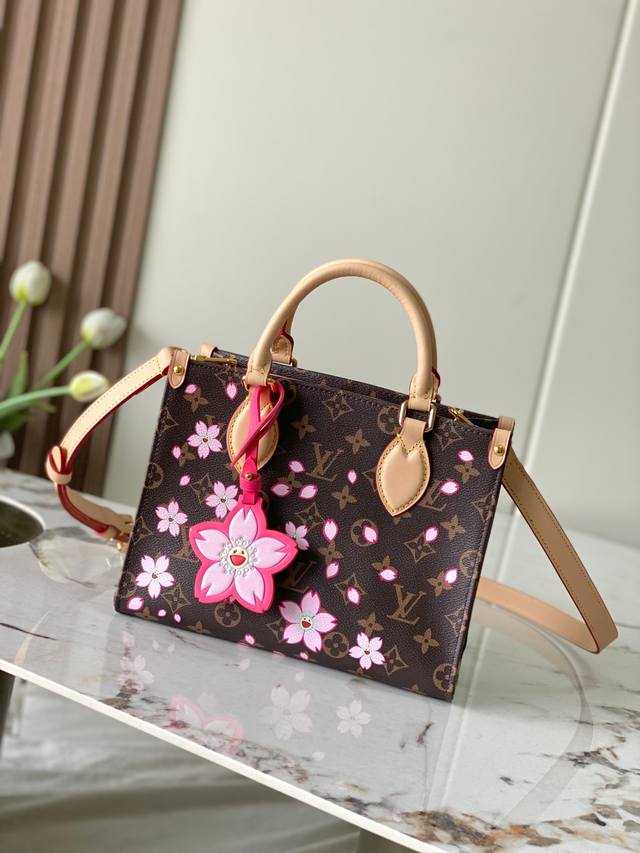 163C01 Chip M13269 Sakura Murakami This Onthego Small Handbag Is From The Louis