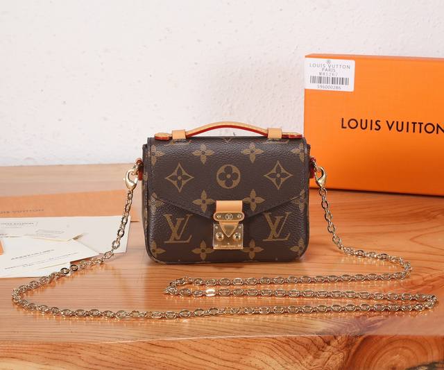 The Top Original And Enhanced Micro M Tis Chain Bag Is Made Of Monogram Canvas,