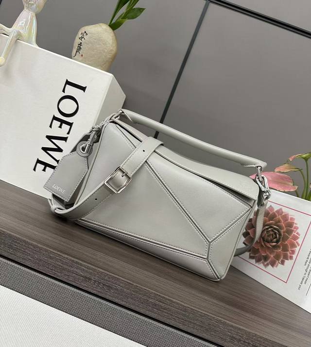 Lowthe New Small Size Featherlight Puzzle Handbag In Nappa Leather Has A Unique