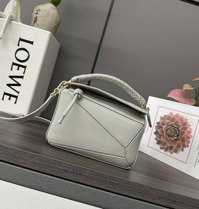 Low The Mini Smooth Cowhide Puzzle Bag Has A Unique Geometric Line Outline Of Th