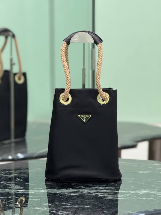 Runway Bucket Bag This Re-Nylon Bag Is Designed With Nylon Fabric And Calfskin.