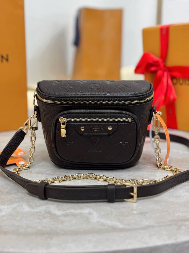 Mini Bumbag M13827 Chocolate This Mini Bumbag Is Made Of Monogram Empreinte Soft
