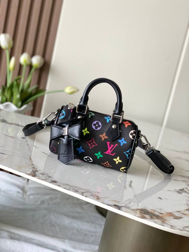 163C M13406M13391 This Nano Speedy Handbag Uses Monogram Coated Canvas And Cowhi