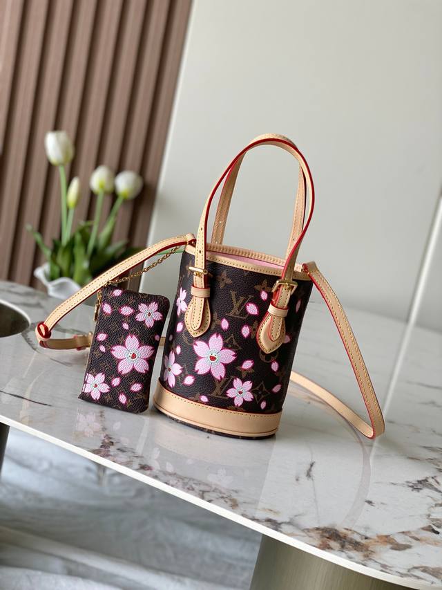 163C01 M13417 This Nano Bucket Handbag Is Exquisitely Designed With Classic Mono
