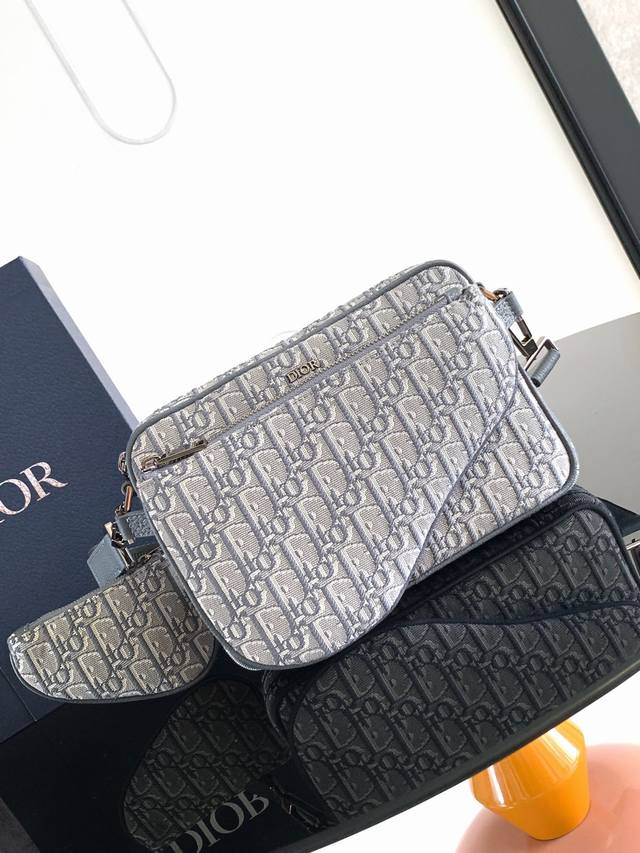 Crafted In Dark Grey Oblique Print Fabric, This Three-Piece Saddle Bag Is Eye-Ca