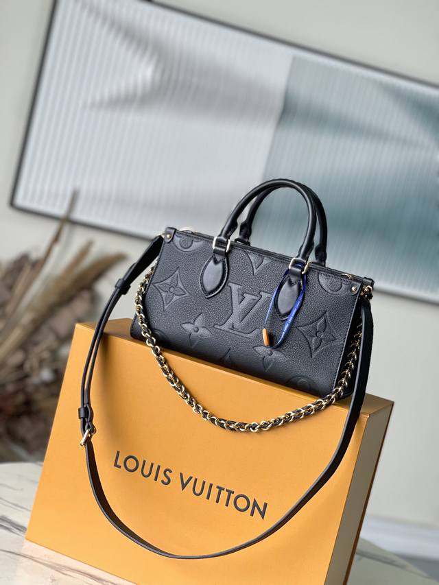 Top Layer Leather, Original M23, Black This Onthego East West Handbag Introduces