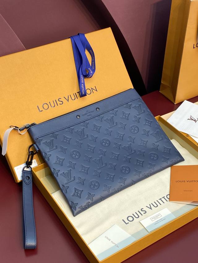 M14914 New Embossed Navy! The Pochette To-Go Clutch Is Made Of Monogram Shadow E