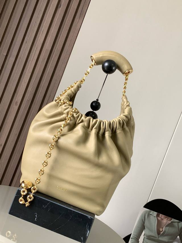 The Same Small Nappa Leather Squeeze Handbag As The Celebrity Style Is A Delicat