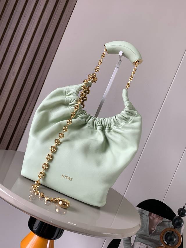 The Same Small Nappa Leather Squeeze Handbag As The Celebrity Style Is A Delicat