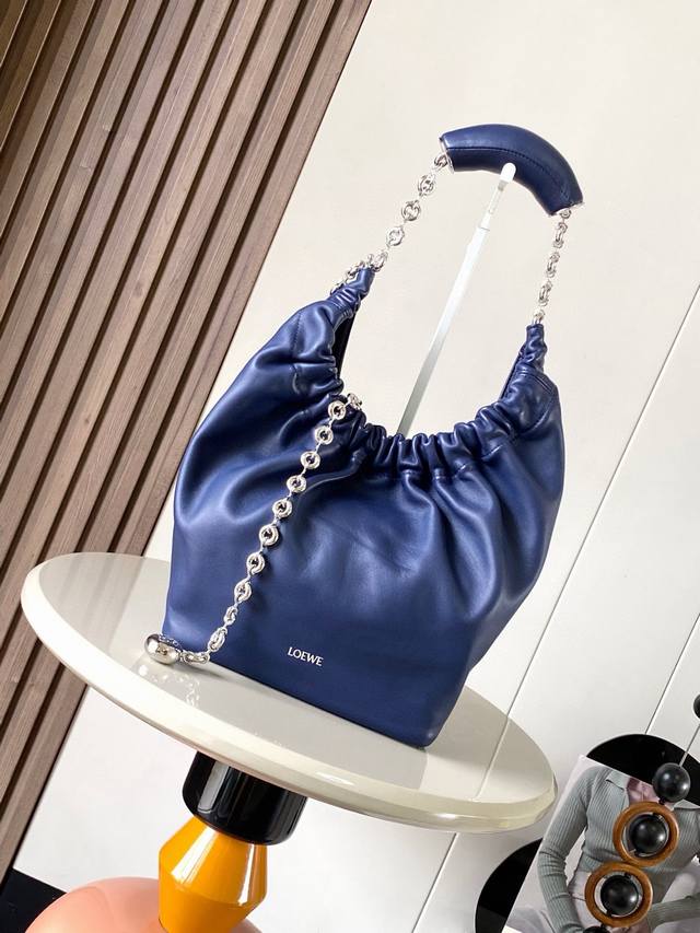 The Same Small Nappa Leather Squeeze Handbag As The Celebrity Style Is A Delicat