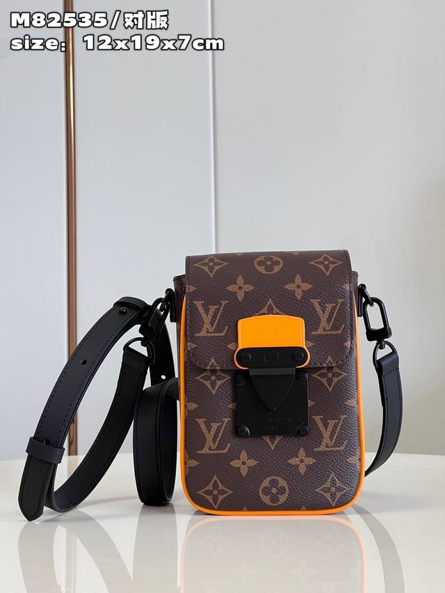 Top Original Home Real Shot M82535 The S Lock Vertical Mini Handbag Has The Icon