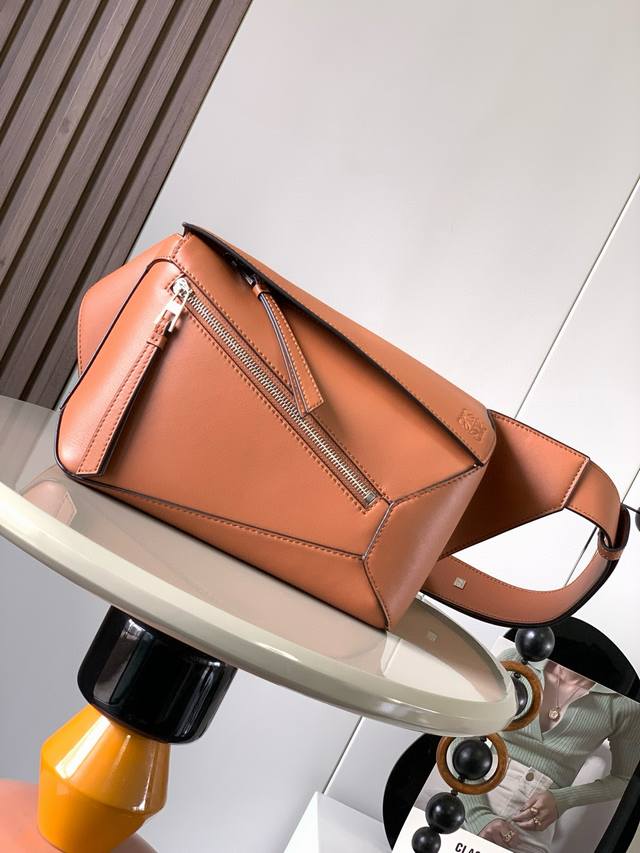 New Small Classic Cow Leather Puzzle Waist Bag. The Rectangular Shape And Precis
