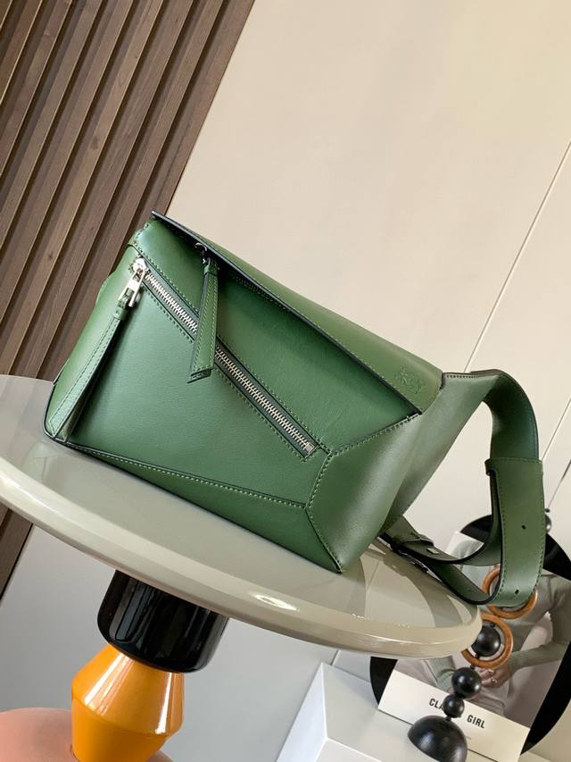 New Small Classic Cow Leather Puzzle Waist Bag. The Rectangular Shape And Precis