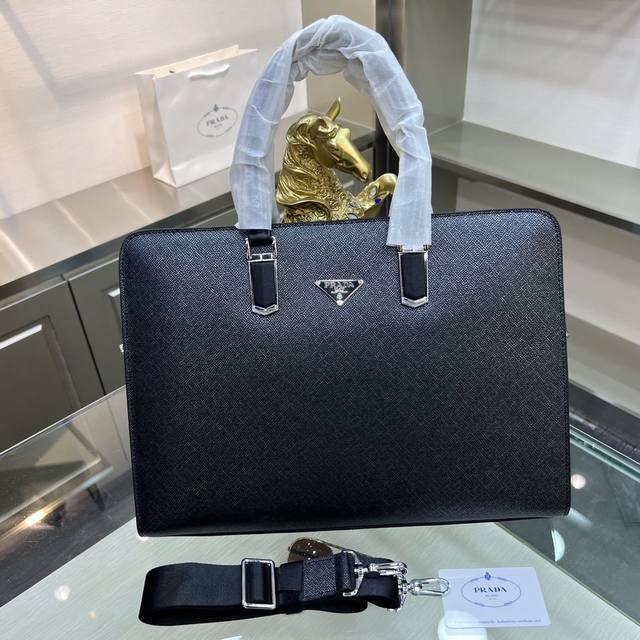 Prada Prada's New Briefcase Is Made Of Imported Cowhide, Top-Grade Polished Stai