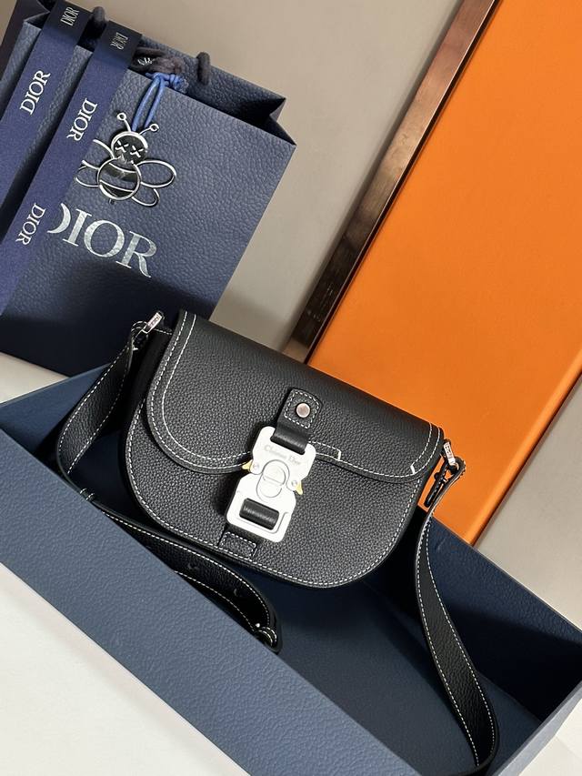 This Saddle Clutch With Shoulder Strap Is A New Item From The Spring 2023 Men's