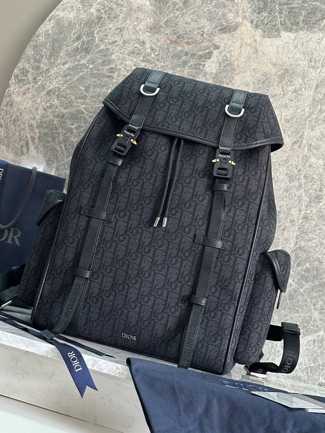 This Dior Hit The Road Flap Backpack Combines Modern Style With Dior's Couture S