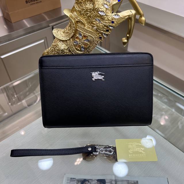 Burberry Burberry Men's Clutch Is Made Of Cross-Grain Leather To Create A Slende