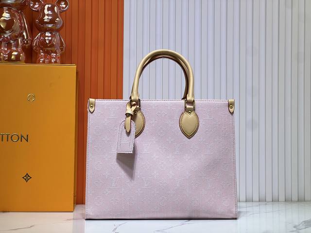 M13081 M45039 M46781 Grey Denim Onthego Medium Handbag The Onthego Medium Handba