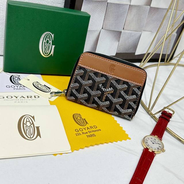 Goya Matignon Mini Wallet Features A Full-Zip Closure Design. The Central Compar