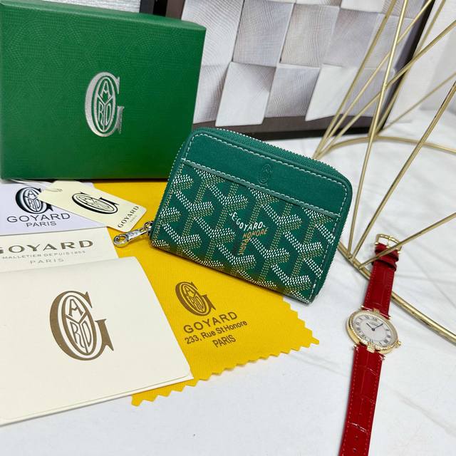 Goya Matignon Mini Wallet Features A Full Zipper Closure. The Central Compartmen