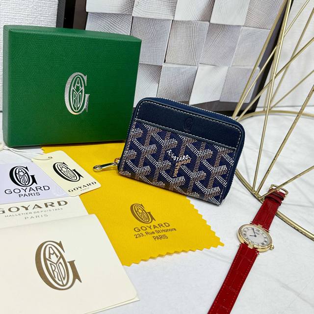 Goya Matignon Mini Wallet Features A Full Zipper Closure Design. The Central Com