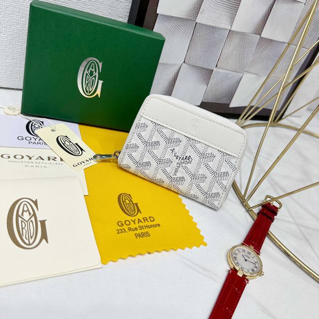 Goya Matignon Mini Wallet Features A Full-Zip Closure Design. The Central Compar