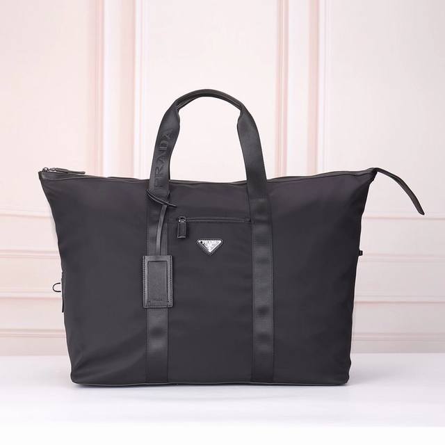 Prada - Prada's Latest Travel Bag, Officially Synchronized With The Website. Mad