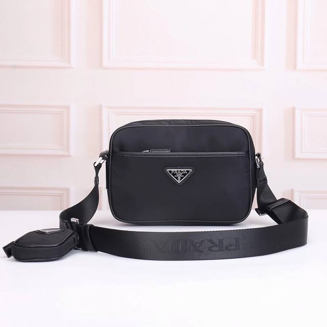 Prada - Prada's Latest Men's Crossbody Bag, Officially Synchronized. Made With O