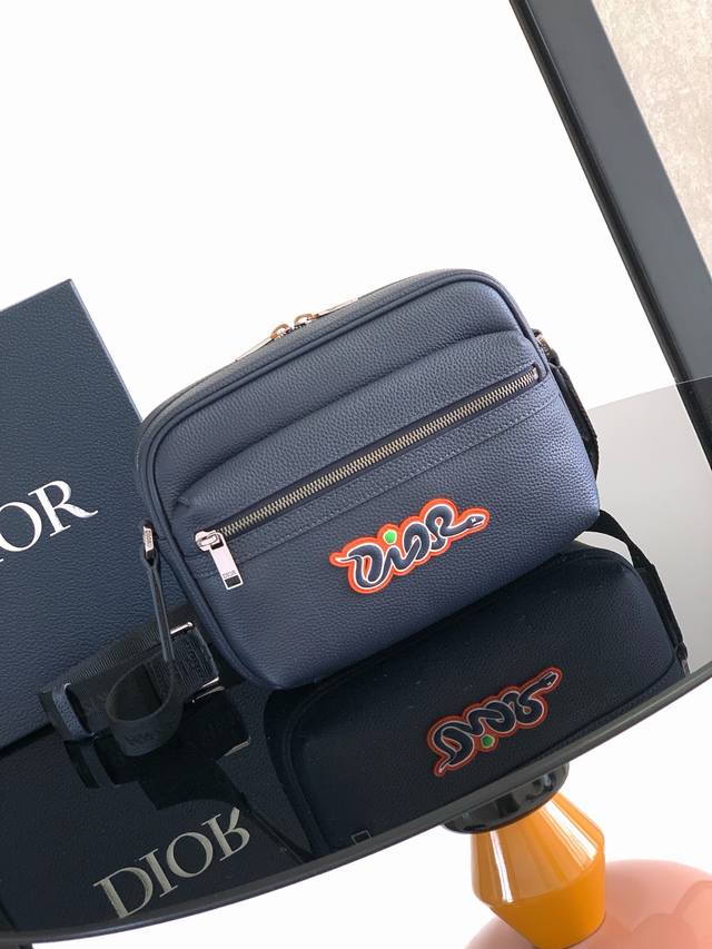 This Rider 2.0 Zipper Messenger Bag From The Dior And Kaws Limited Edition Serie