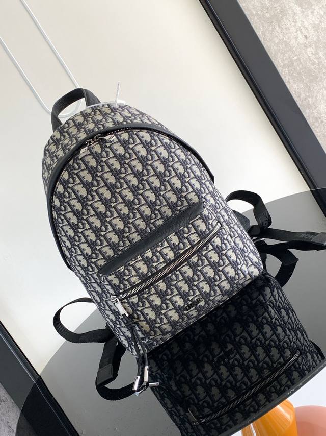 Small Black Lettering Under The Logo This Rider Backpack Features A Sleek Silhou