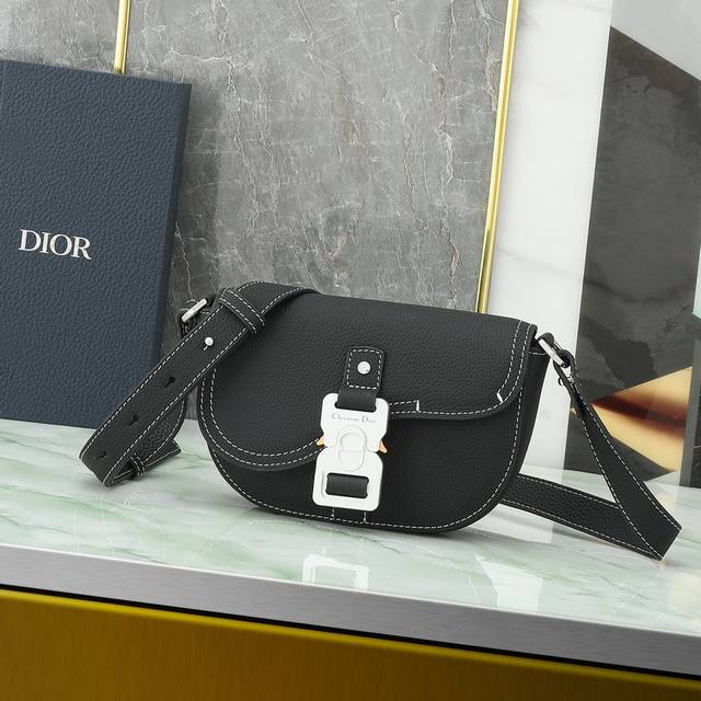 This Saddle-Shaped Clutch Bag With A Shoulder Strap Is A New Addition To The 202