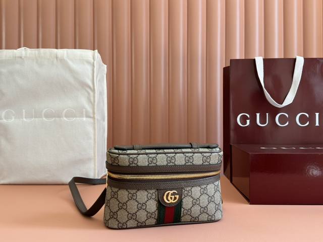 The Ophidia Series' Iconic Double G Design And Striped Woven Strap Elements Infu