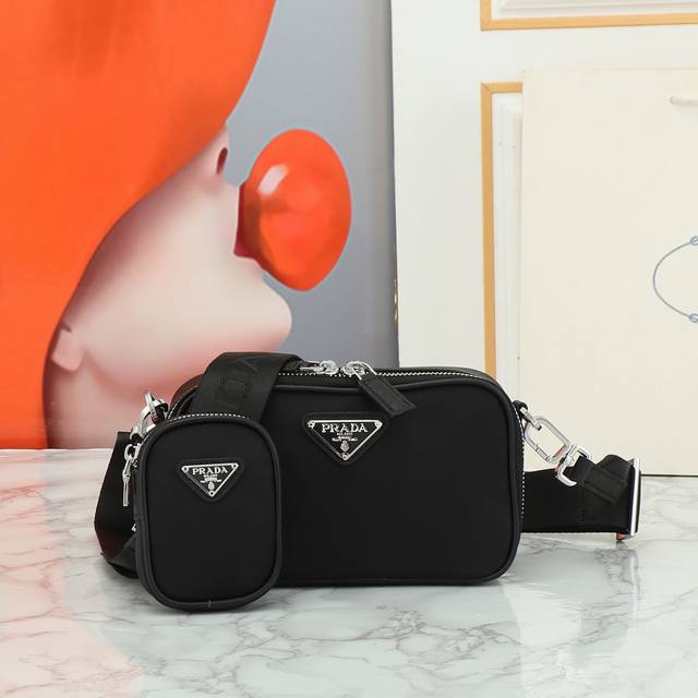 Restocked Latest Model In Stores. The Iconic Prada Men's Handbag Is Reinterprete