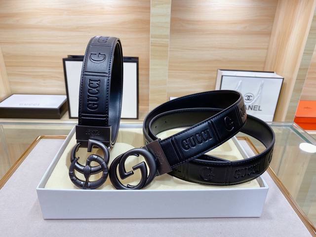 Gucci The New G-Shaped Buckle, Inspired By The Brand's Iconic 1970S Design, Has