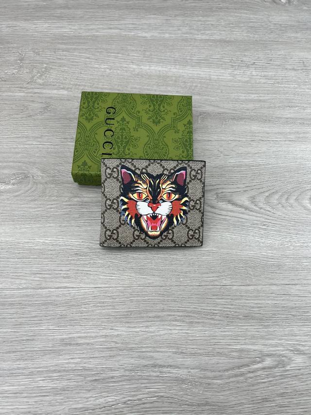 Gucci Gg Wolf Print Wallet. Gucci Small Leather Accessories Push The Boundaries